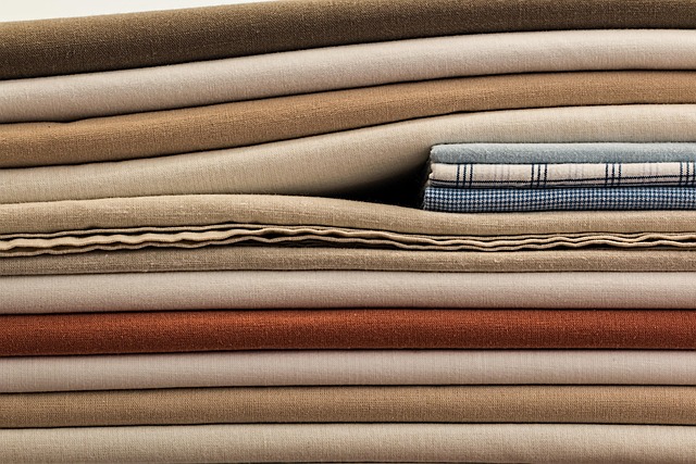 premium linen fabric roll neutral tones craft sewing supplies close-up